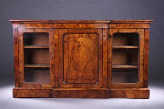 Appraisal: EDWARDIAN BURL WALNUT BREAKFRONT BOOKCASE Late th century string and