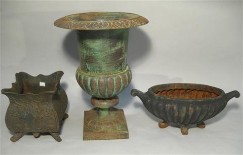 Appraisal: THREE SMALL CAST IRON CACHE POTS The group comprising a