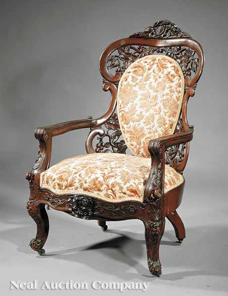 Appraisal: An American Rococo Carved and Laminated Rosewood Library Armchair mid-