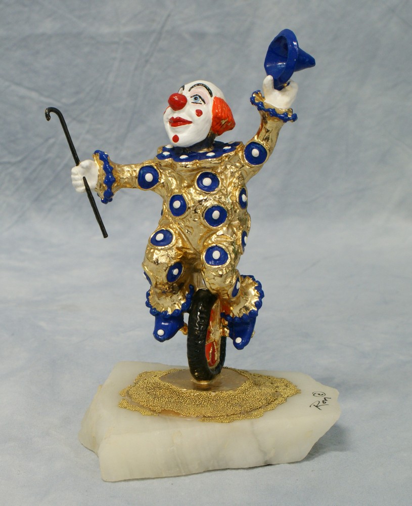 Appraisal: Ron Lee metal clown on unicycle figurine on stone base