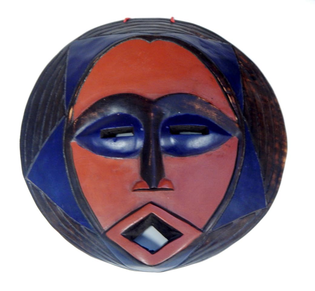 Appraisal: Tribal Art A modern African coloured mask cm diam