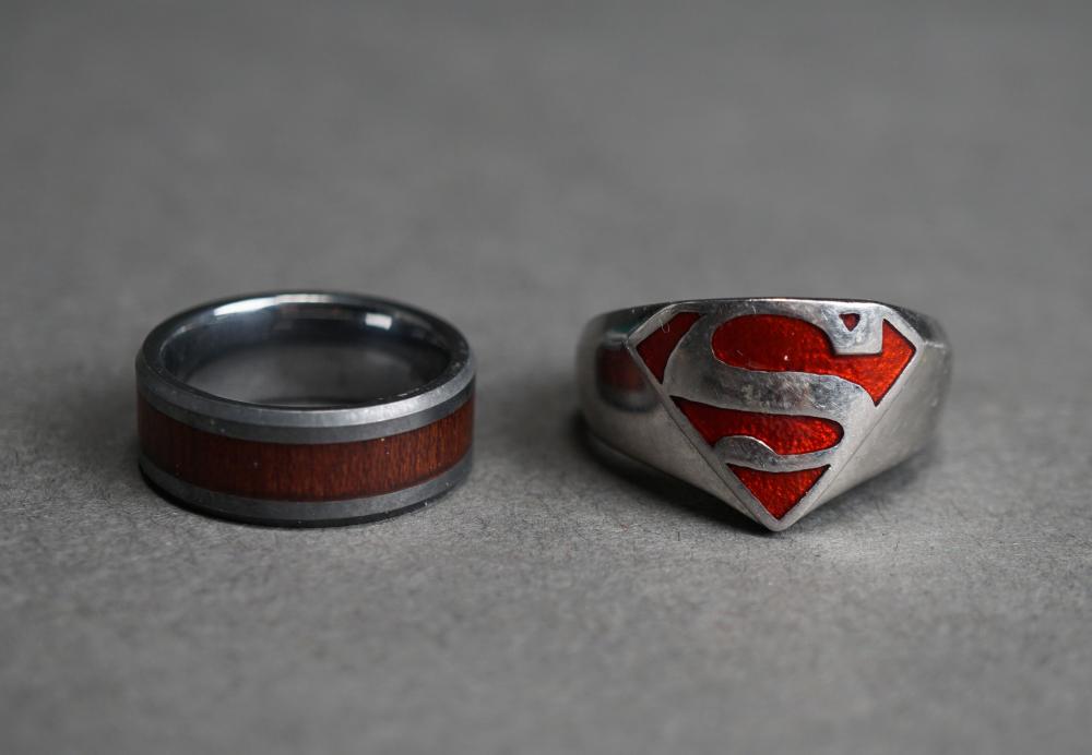 Appraisal: TUNGSTEN CARBIDE RING SIZE - AND STAINLESS STEEL 'SUPERMAN' RING