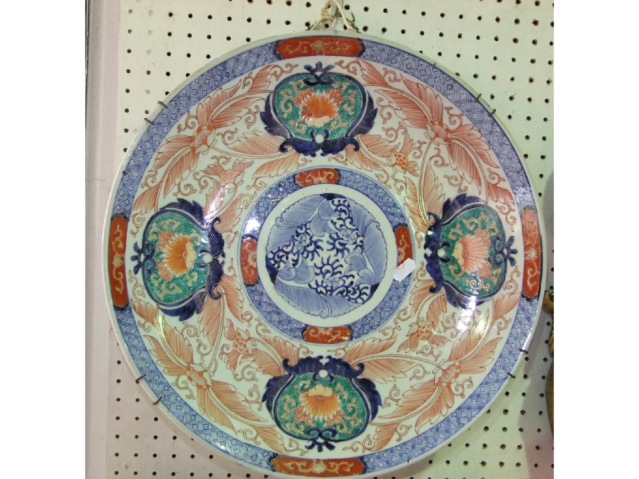 Appraisal: A th century Imari charger with painted leaf and floral