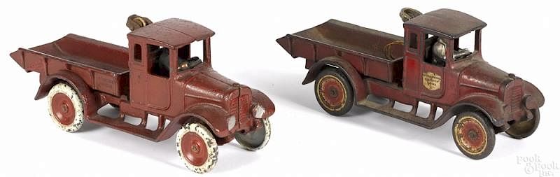 Appraisal: Two Arcade cast iron International Harvester red b Two Arcade