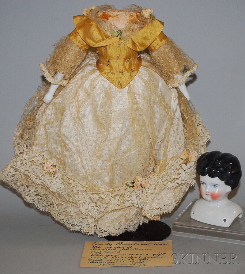 Appraisal: Black-haired China Doll Germany late th century light blue painted