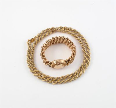 Appraisal: A yellow and white gold twisted rope link necklace Stamped