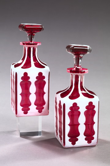 Appraisal: Pair of Bohemian Cut Lattimo Over Cranberry Overlay Glass Liqueur