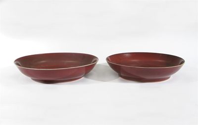 Appraisal: Two Chinese copper-red glazed saucer dishes both with six character