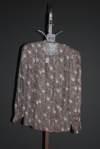 Appraisal: Andr Laug brown long sleeve silk blouse with circle print