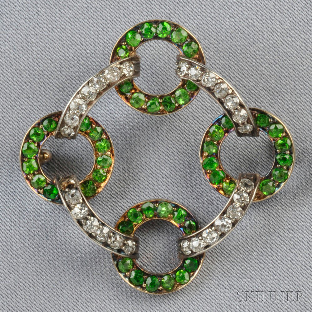 Appraisal: Antique Demantoid Garnet and Diamond Brooch set with circular-cut demantoid