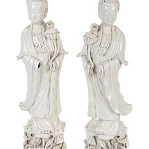 Appraisal: A Pair of Large White Glazed Porcelain Figures of Guanyin