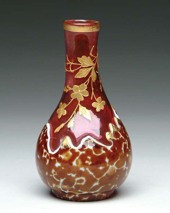 Appraisal: OVERLAY CRANBERRY VASE Cranberry glass with gold enameling of blossoms