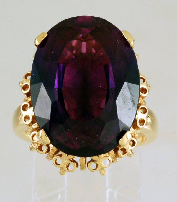 Appraisal: Large simulated Alexandrite ring K yellow gold ring mounting four