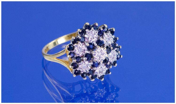 Appraisal: ct Gold Diamond And Sapphire Cluster Ring Central Diamond Surrounded