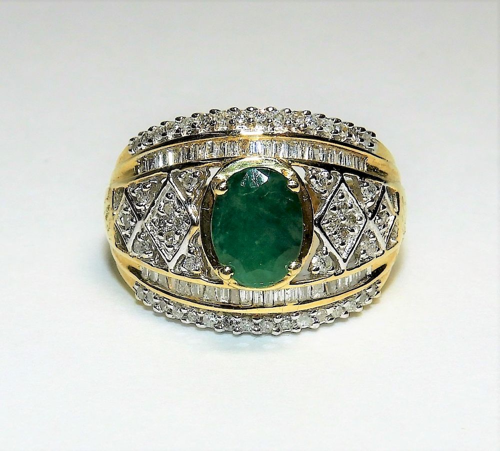 Appraisal: K Yellow Gold Diamond Emerald Cocktail Ring Contemporary Oval cut