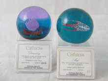 Appraisal: Two Caithness paperweights '' Discovery '' and '' Argo ''