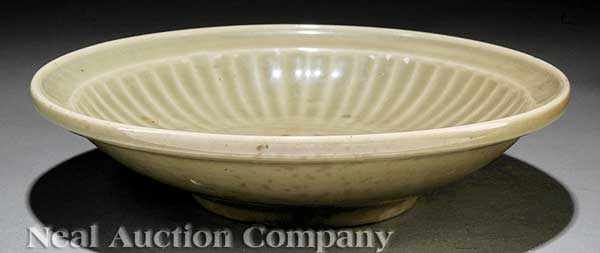 Appraisal: A Chinese Longquan Celadon Deep Dish Ming Dynasty - carved