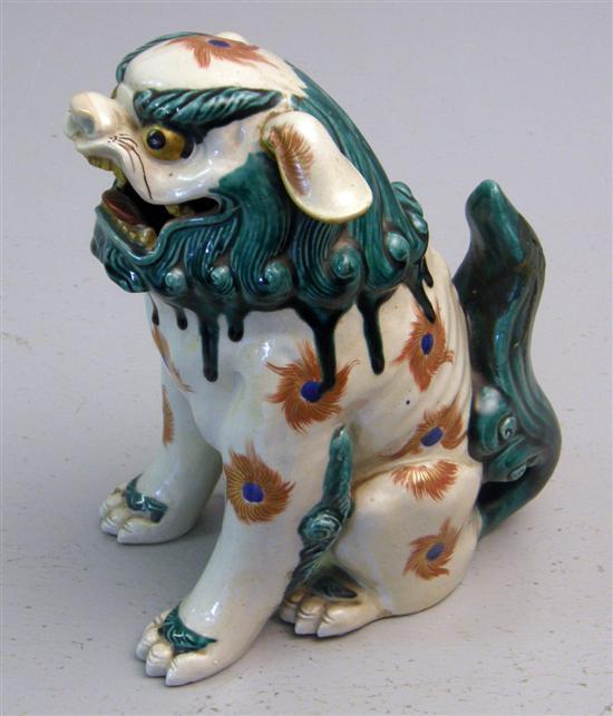 Appraisal: Japanese pottery lion the mane and tail in a dark