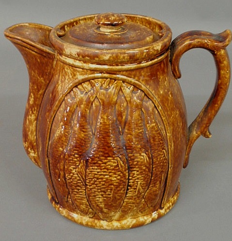 Appraisal: Large Rockingham type pitcher with fish decoration h x w