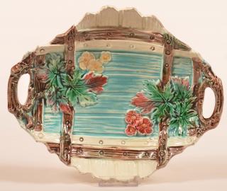 Appraisal: Majolica Floral Embossed Oval Bowl Majolica Floral Embossed Open Handled