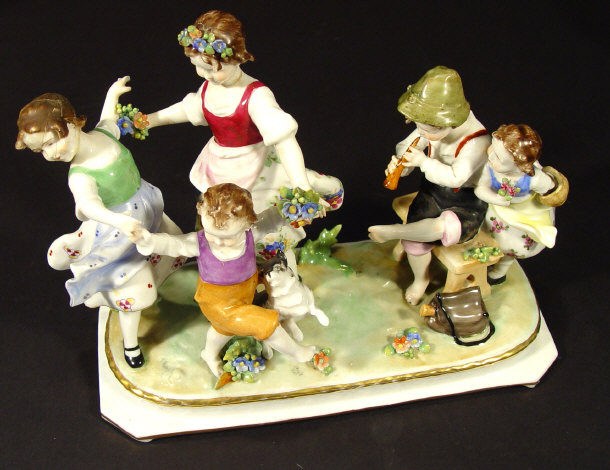 Appraisal: Continental porcelain figure group of children dancing before a musician