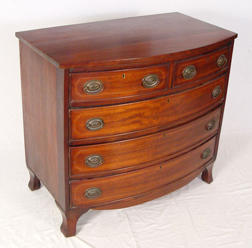 Appraisal: TH CENTURY MAHOGANY HEPPLEWHITE STYLE BOWFRONT CHEST drawers over full