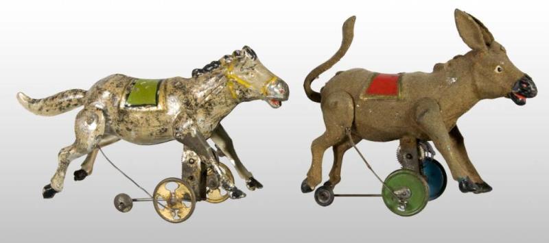 Appraisal: Lot of Tin Hand-Painted Donkey Wind-Up Toys Description German Working