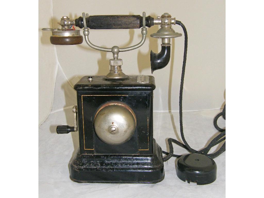 Appraisal: Danish Magneto telephone comprising a wooden handled receiver over an