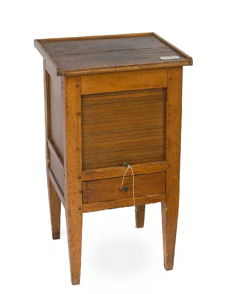 Appraisal: A Neoclassical mixed wood bedside cabinet evidence of woodworm damage