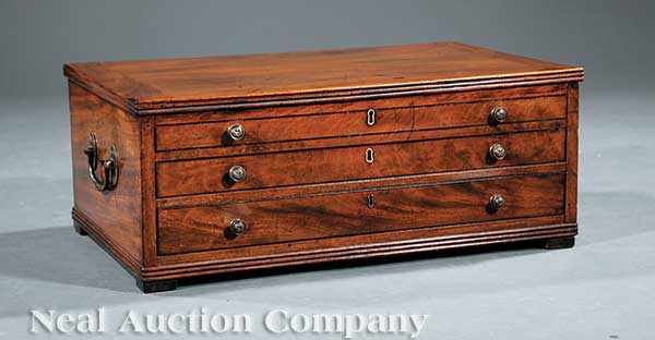 Appraisal: An English Mahogany Cutlery Canteen c lift top applied reeded