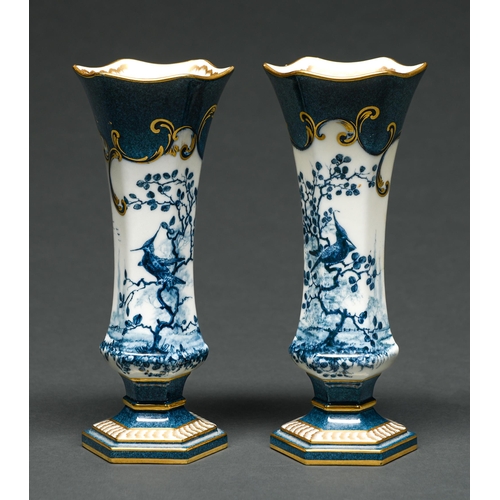 Appraisal: A pair of Royal Worcester flared hexagonal powder blue ground