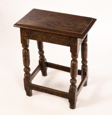 Appraisal: A carved oak joint stool on baluster turned legs united