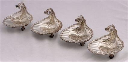 Appraisal: SET OF FOUR DOMINICK HAFF SILVER TRIPOD SHELL-FORM DISHES Each