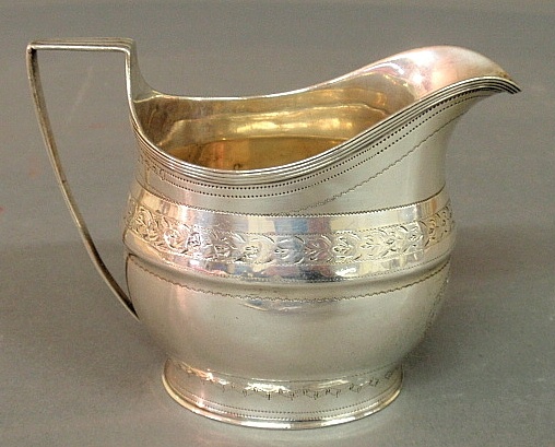 Appraisal: - Delicate George III silver cream pitcher by Peter and