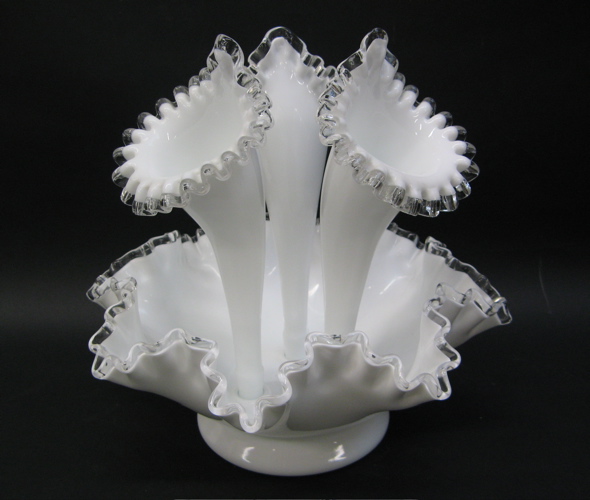 Appraisal: WHITE AND CLEAR GLASS EPERGNE having three glass trumpets rising