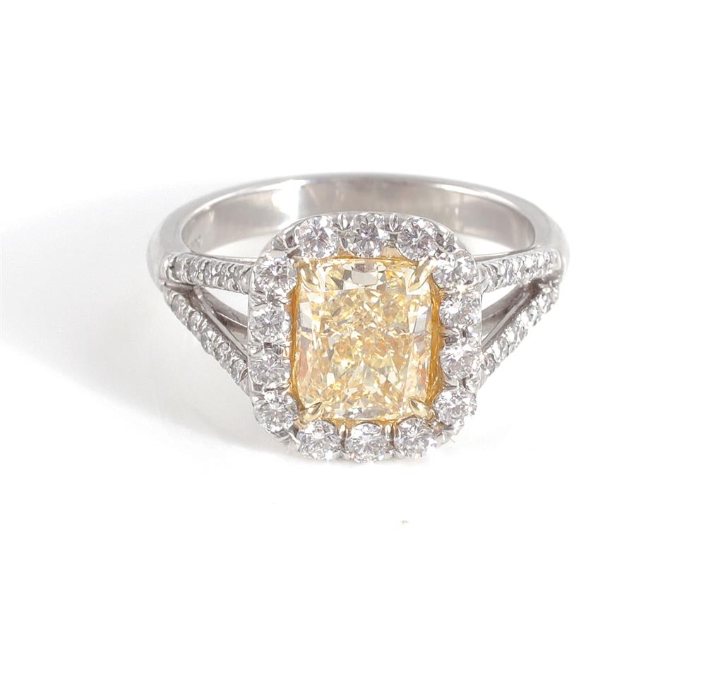 Appraisal: Platinum and fancy intense yellow diamond ring ct cushion-cut fancy