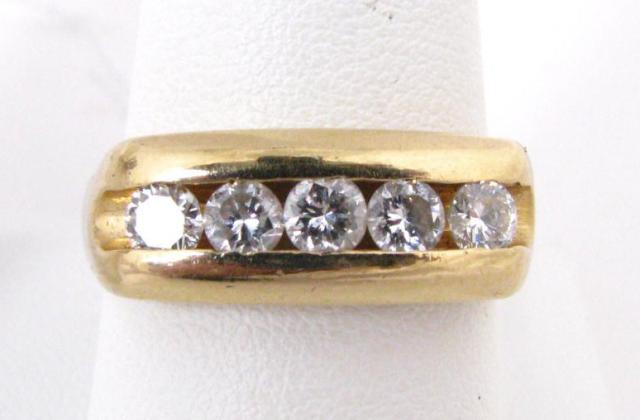 Appraisal: Gents K Yellow Gold Channel Set Five Diamond Band with