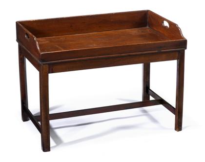 Appraisal: English mahogany butler's tray-on-stand mid th century The rectangular top