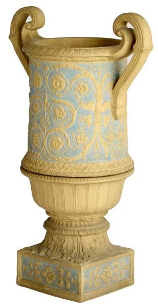 Appraisal: ROOKWOOD Large terra cotta garden urn and stand decorated in