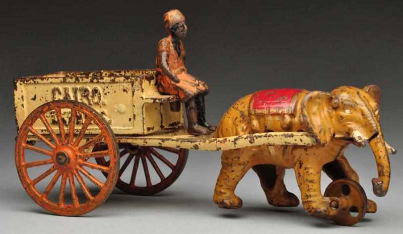 Appraisal: Cast Iron Cairo Express Elephant-Drawn Toy Description American Made by