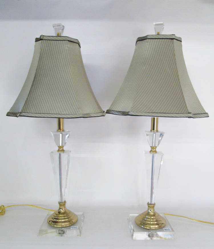 Appraisal: PAIR OF LUCITE TABLE LAMPS having tapering Lucite and brass