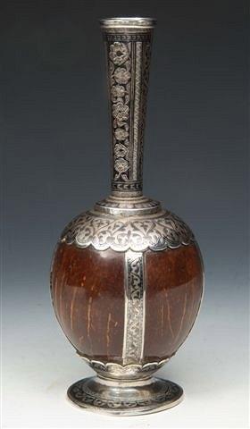 Appraisal: A RUSSIAN SILVER AND NIELLO MOUNTED COCONUT SHELL BOTTLE with