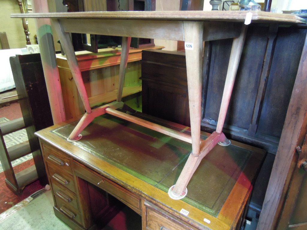 Appraisal: A light oak and beechwood kitchen table the canted rectangular