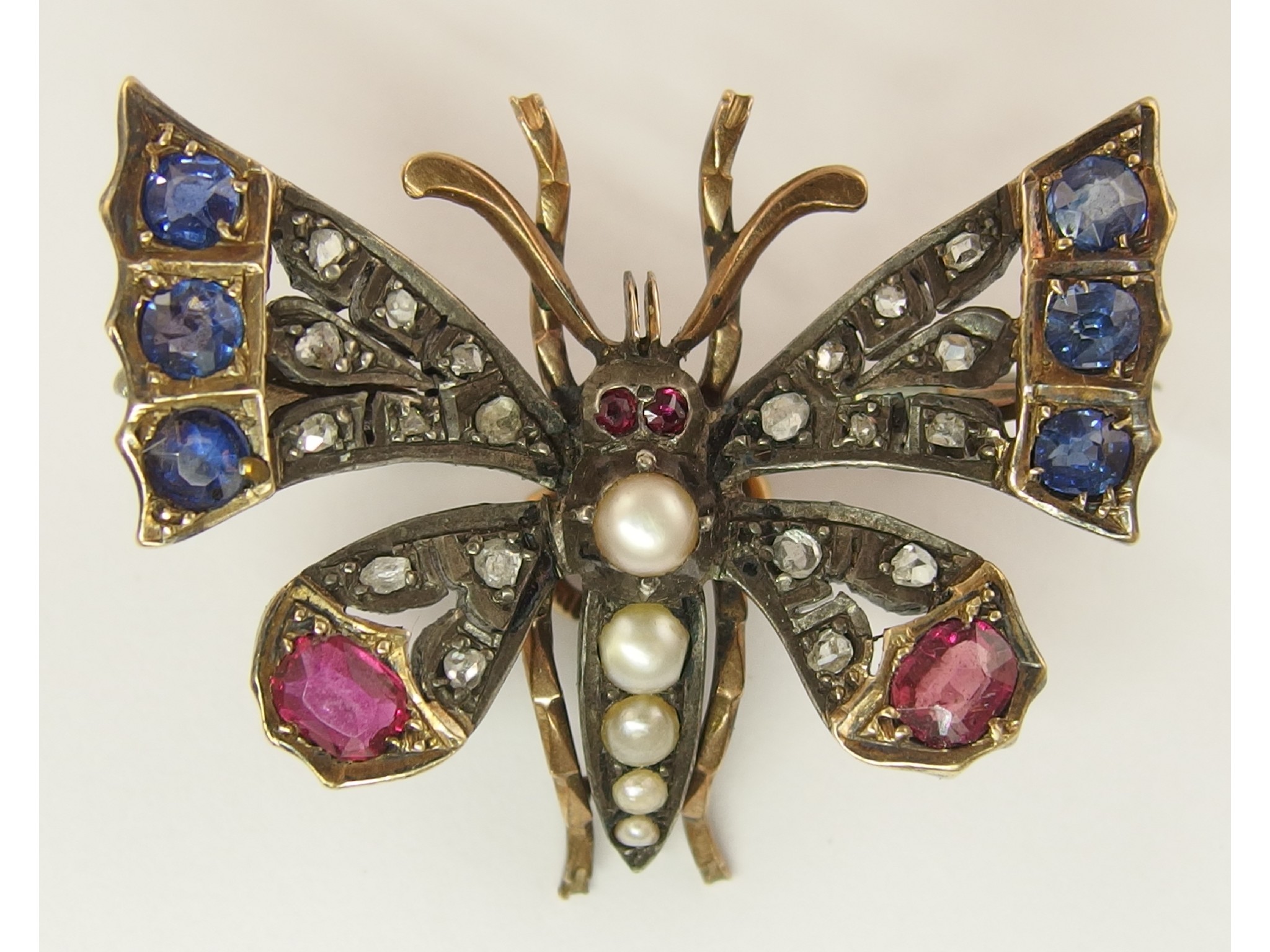 Appraisal: A Gem set butterfly broochset with rose cut diamonds pearls