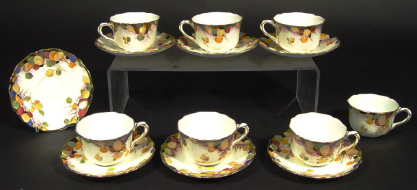 Appraisal: Seven Royal Doulton cups and saucers each hand coloured and