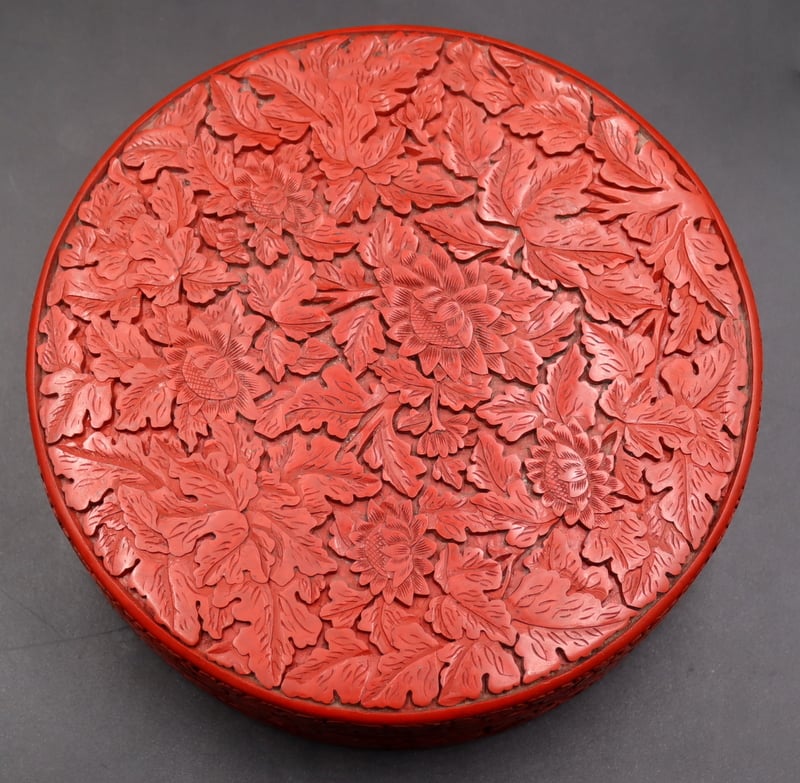 Appraisal: TH C CHINESE CINNABAR LIDDED BOX Ming style floral decoration