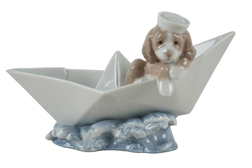 Appraisal: LLADRO BARCO DE PAPEL FIGUREwith new box approximately inches wide