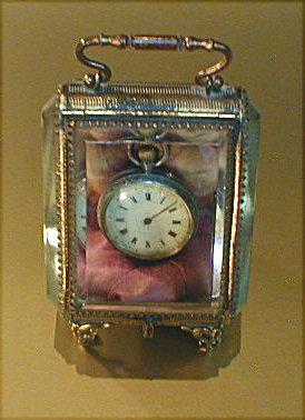 Appraisal: A small silver fob watch within a Victorian Palais Royal