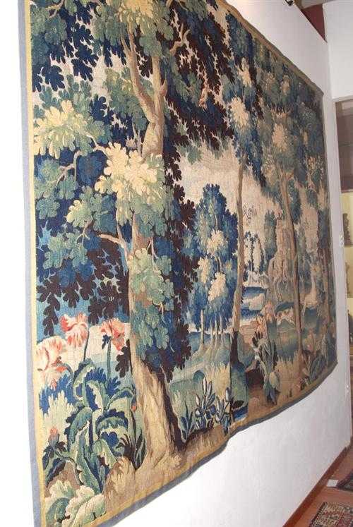 Appraisal: VERDURE TAPESTRY R gence France th century Depicting a hunting