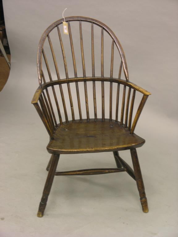 Appraisal: A late th century ash and elm bow-back Windsor armchair